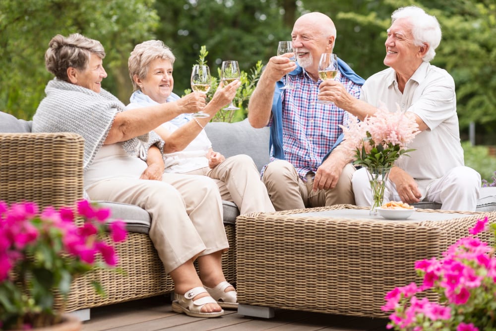 Residents toasting outside of WellQuest of Menifee Lakes in Menifee, California
