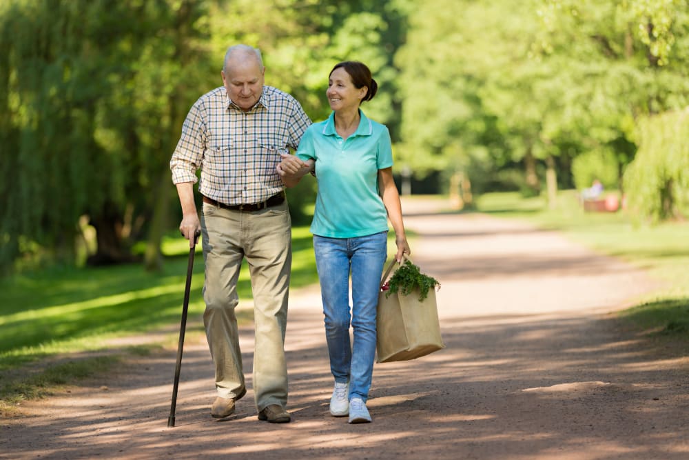 Resident and caregiver getting groceries at WellQuest of Granite Bay in Granite Bay, California