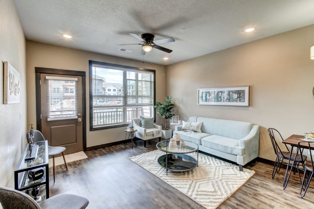 Beautiful Living Room at Timnath Trail at Riverbend Apartment Homes in Timnath, Colorado