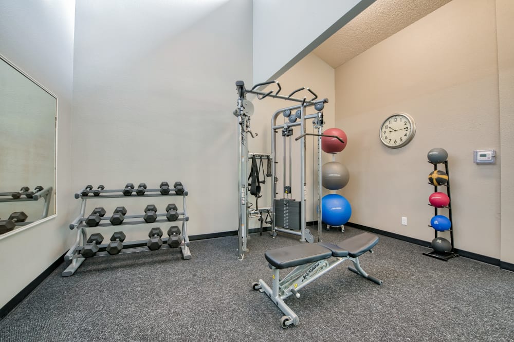 Full sized gym for residents to use at anytime at Lakeside Landing Apartments in Tacoma, Washington
