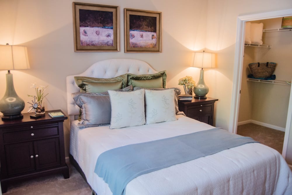 Bedroom with walk-in closet at Lullwater at Saluda Pointe in Lexington, South Carolina