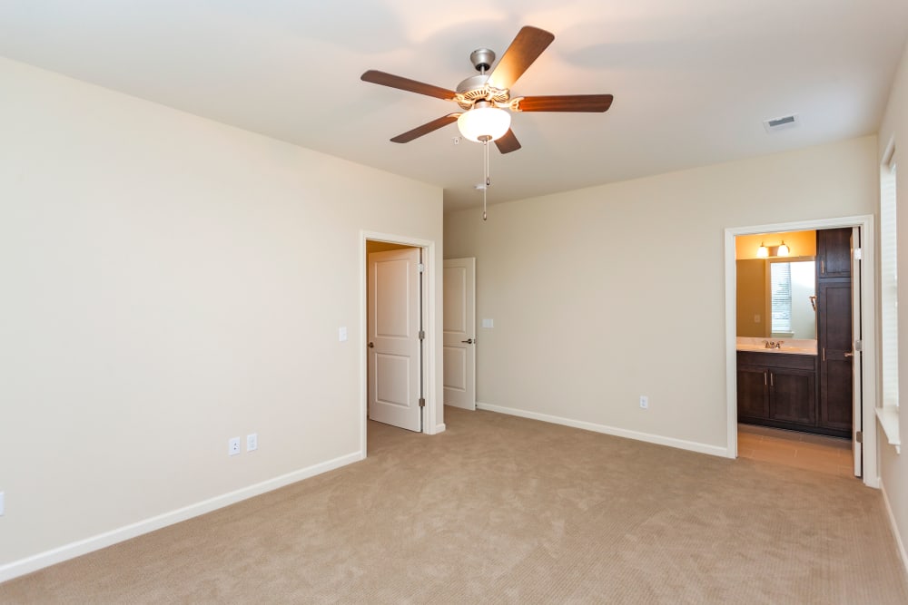 Carpeted bedroom at Madison Crest Apartment Homes in Madison, Tennessee