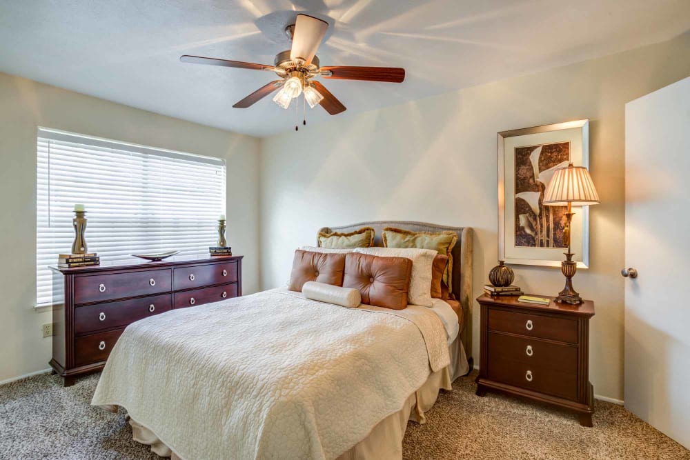 Model bedroom at Willow Oaks Apartments in Bryan, Texas