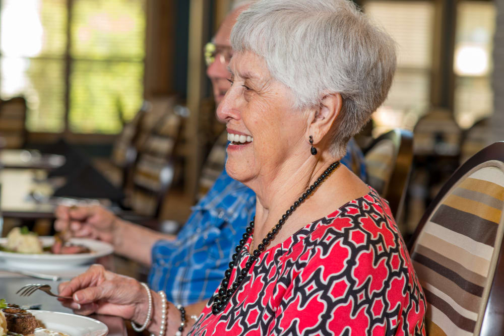A resident dining at an Integrated Senior Lifestyles community