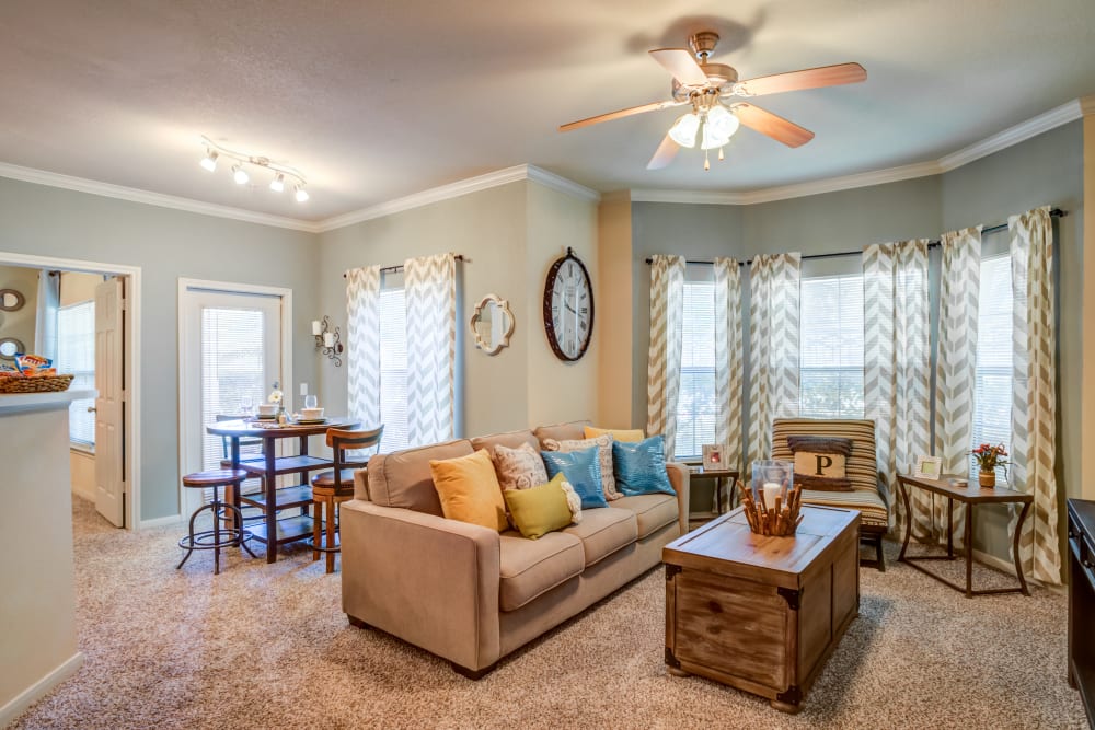 Spacious living area and dining nook at Park Hudson Place in Bryan, Texas
