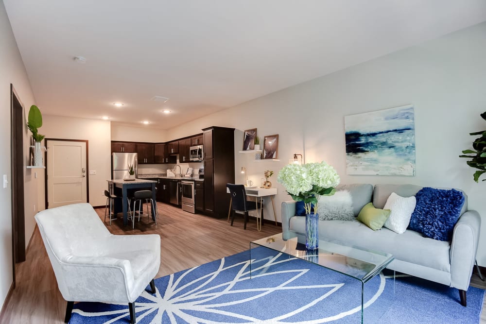 An open concept layout with plenty of space for entertaining guests at Lake Jonathan Flats in Chaska, Minnesota