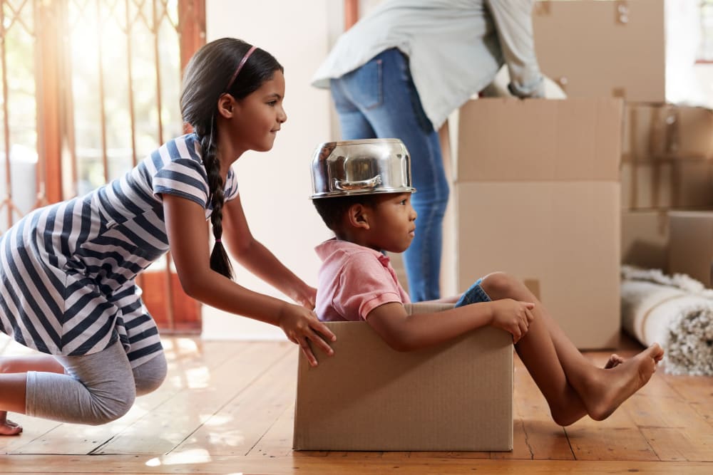 A children having fun moving near Castro Valley Hayward Storage LLC in Castro Valley, California