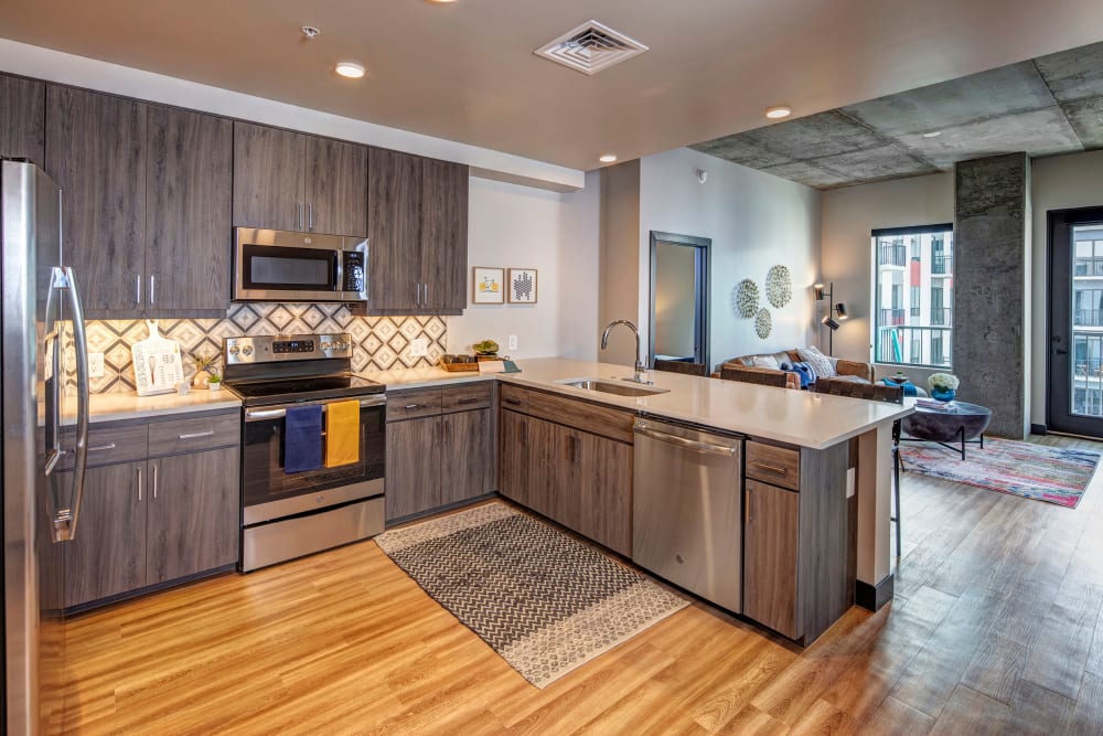 Open kitchen and living room at The Local Apartments in Tempe, Arizona