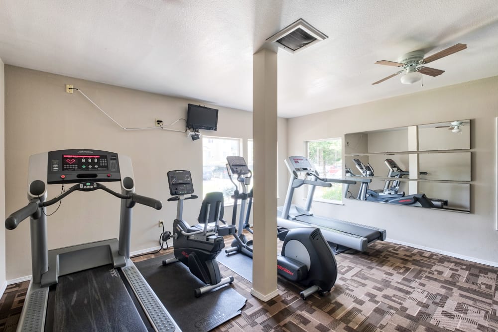 Cardio machines in the fitness center at Arbor Crossing Apartments in Boise, Idaho