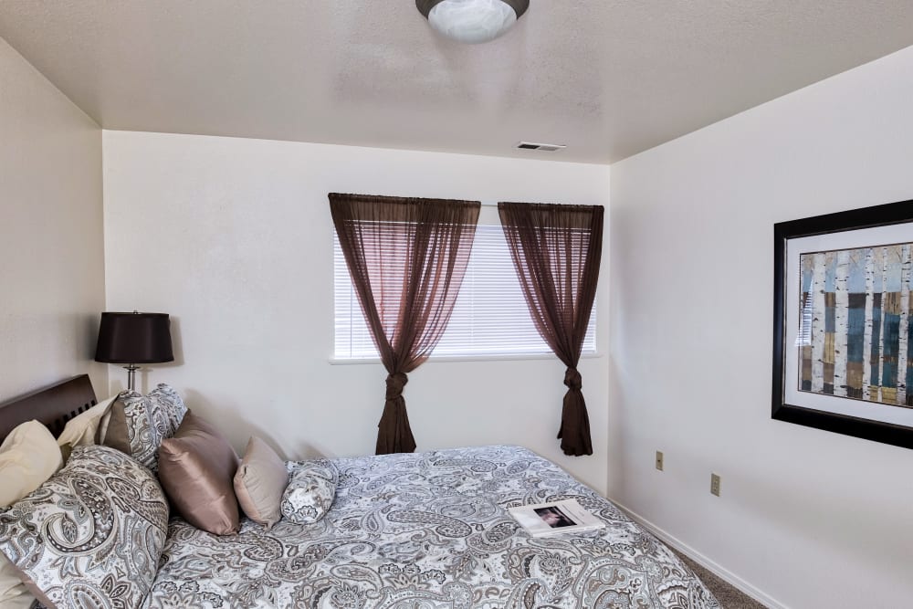Bedroom with lots of natural light at Arbor Crossing Apartments in Boise, Idaho
