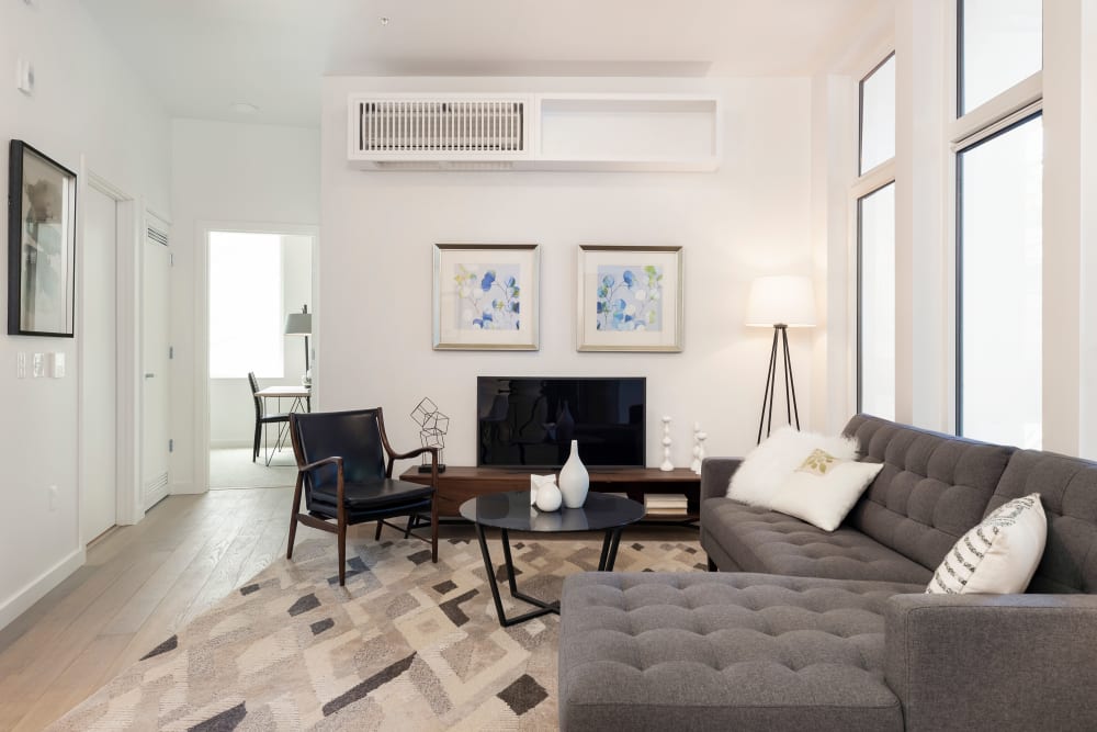 Well-decorated living space in a model home at TwentyTwenty Apartments in Portland, Oregon