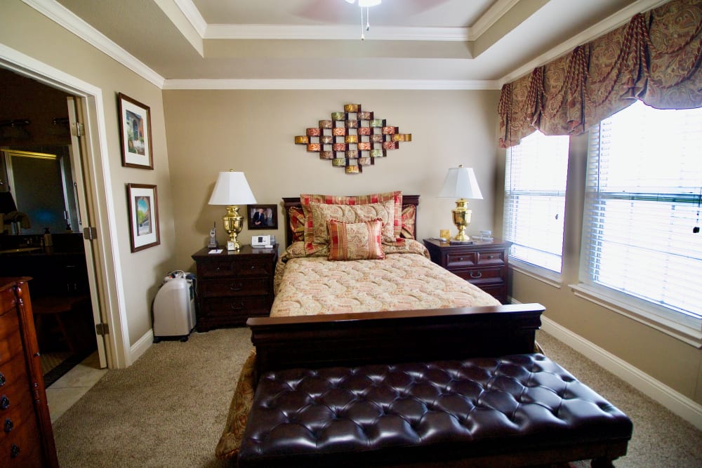 A bedroom in one of the apartments at Isle at Raider Ranch in Lubbock, Texas