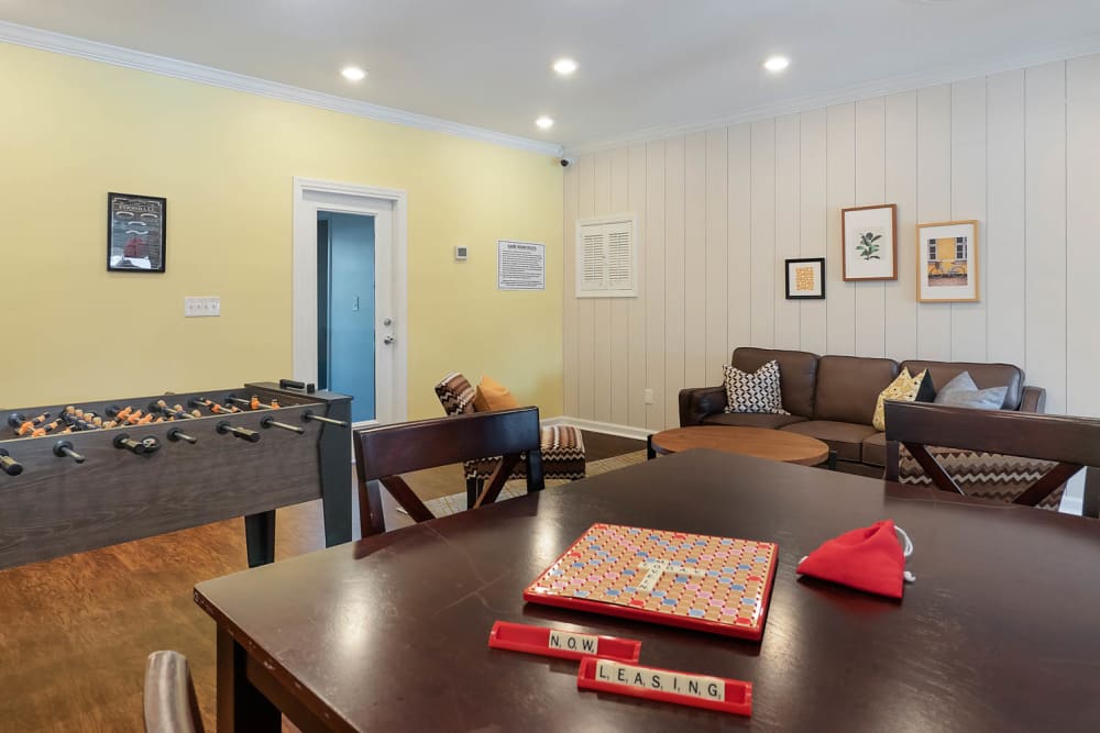 Furnished community center with games and TV at The Reserve at Red Bank Apartment Homes in Chattanooga, Tennessee