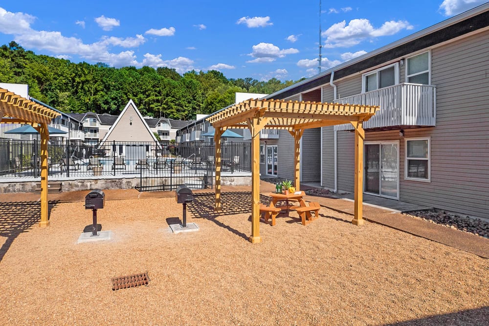 Nice Community BBQ area with wood structures at The Reserve at Red Bank Apartment Homes in Chattanooga, Tennessee