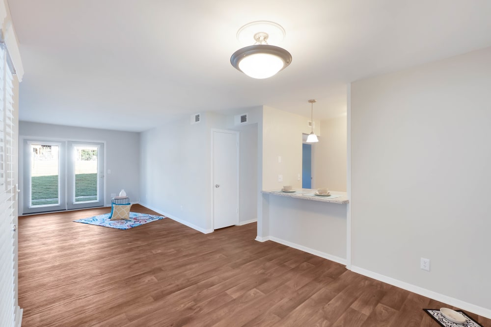 Spacious room with hard wood style flooring at Riverside North Apartment Homes in Chattanooga, Tennessee