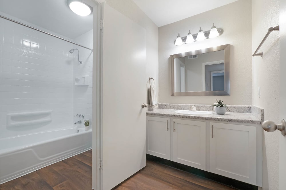 Nice bathroom with a framed mirror Riverside North Apartment Homes in Chattanooga, Tennessee
