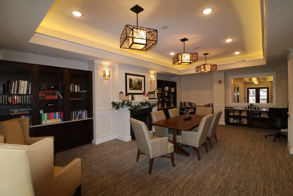 Comfortable seating in the library at Harmony at Five Forks in Simpsonville, South Carolina