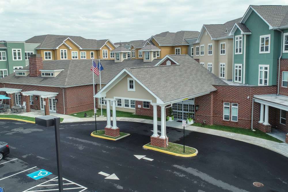 Exterior image of the front entrance to the property at Harmony at Spring Hill in Lorton,Virginia