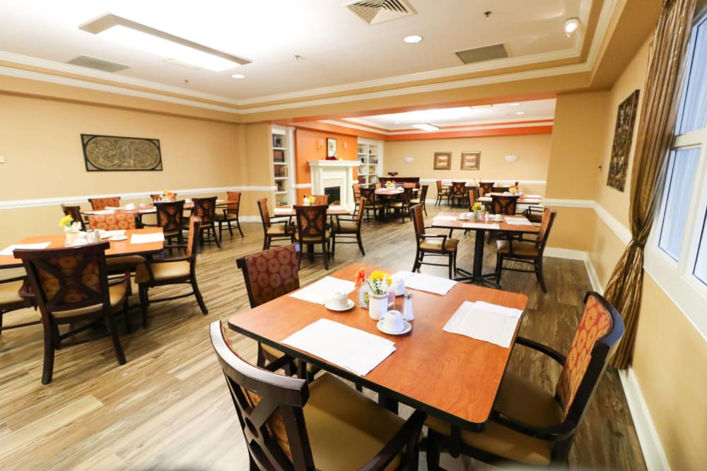 Set dining room tables at Harmony at Ironbridge in Chester, Virginia