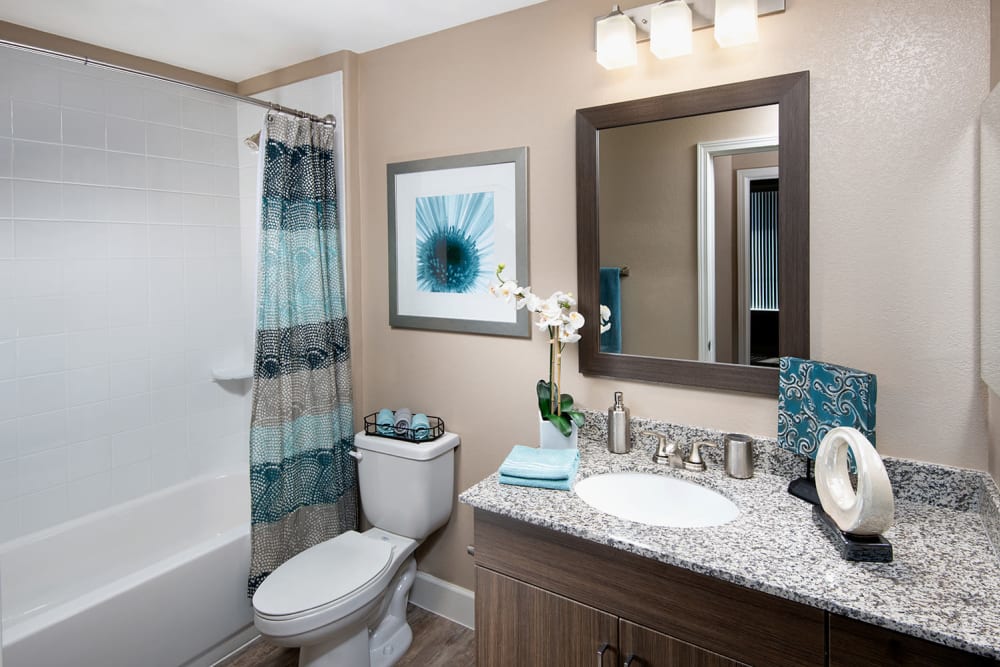 Bathroom with shower and sink at Southern Avenue Villas
