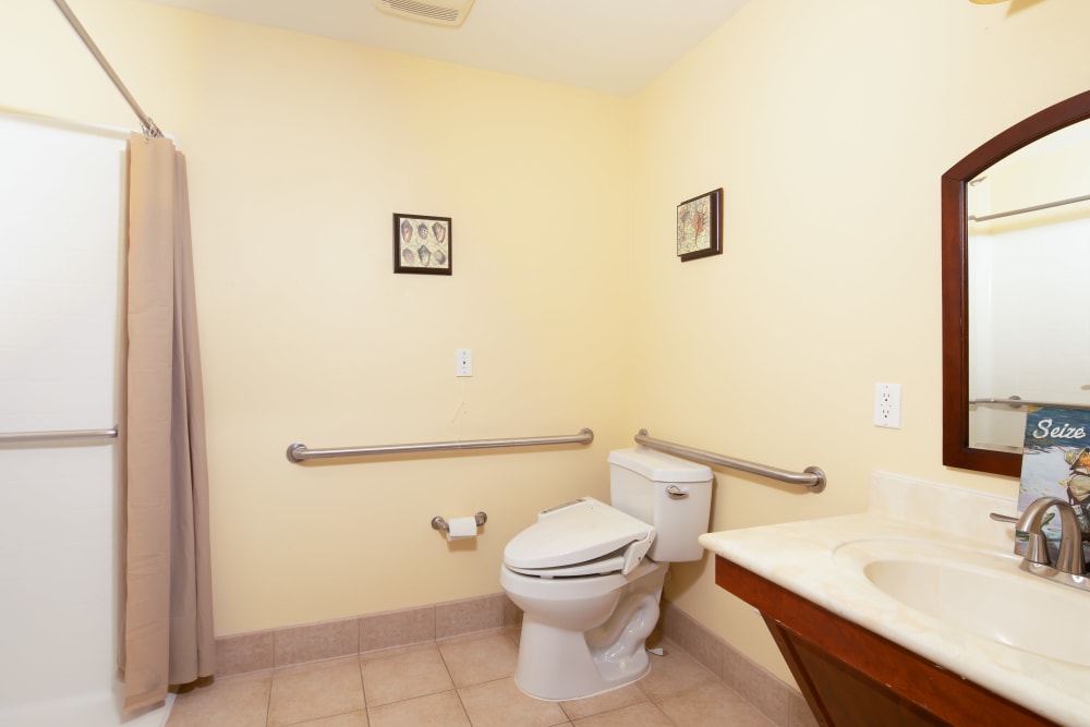 wide angle view of the bathroom in a model unit at Vista Gardens in Vista, California