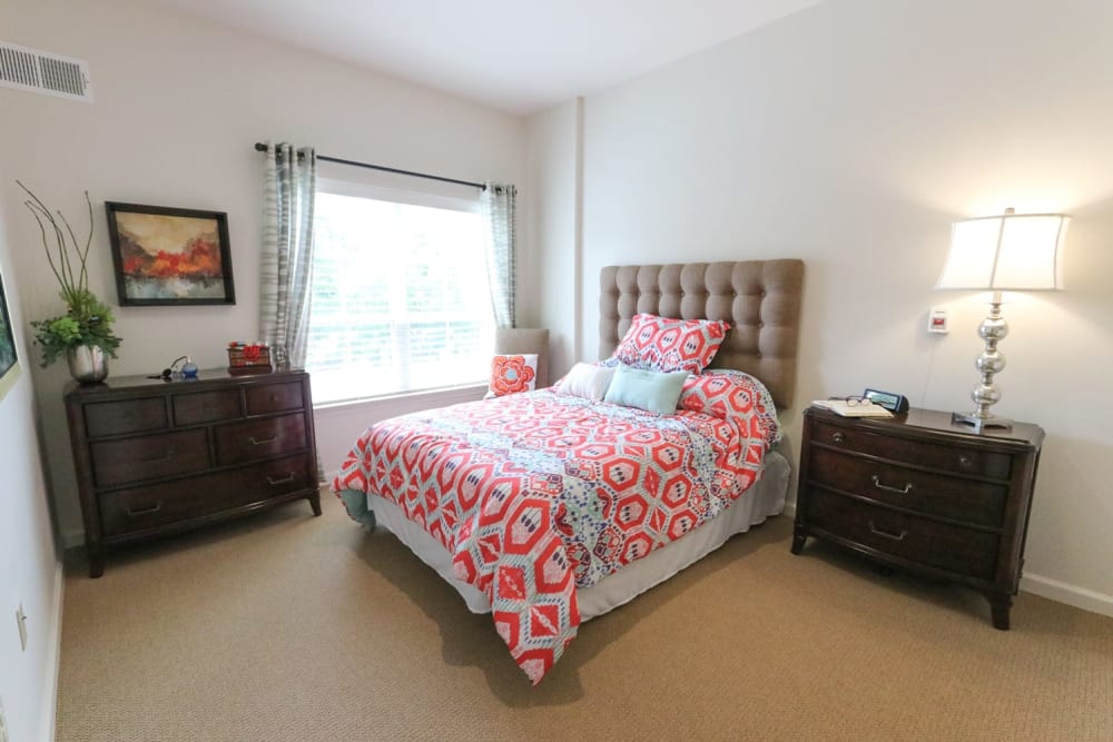 A furnished bedroom at Harmony on the Peninsula in Yorktown, Virginia