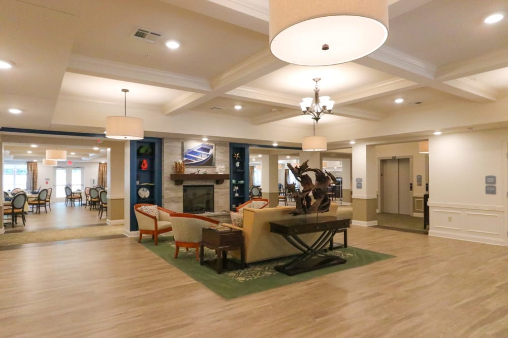 Fireside seating in the lobby at Harmony on the Peninsula in Yorktown, Virginia