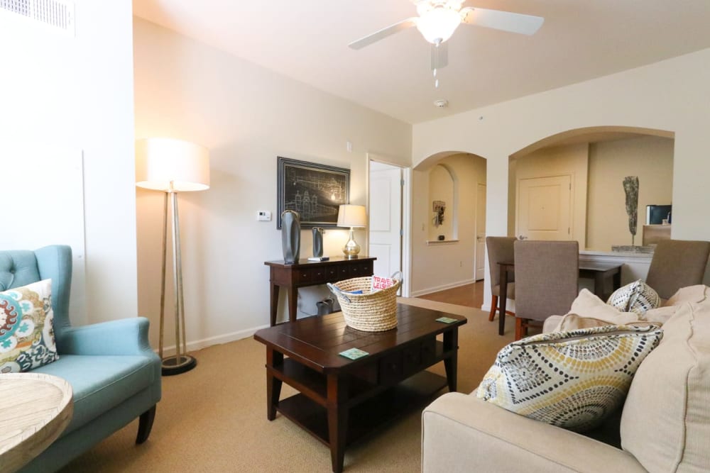 An apartment living room and dining room at Harmony on the Peninsula in Yorktown, Virginia