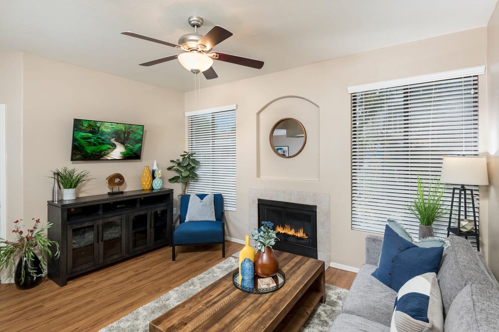 Living room with fireplace at San Antigua in McCormick Ranch