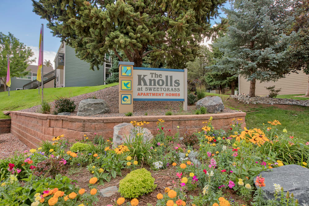 Entry Signage at The Knolls at Sweetgrass Apartment Homes in Colorado Springs, Colorado