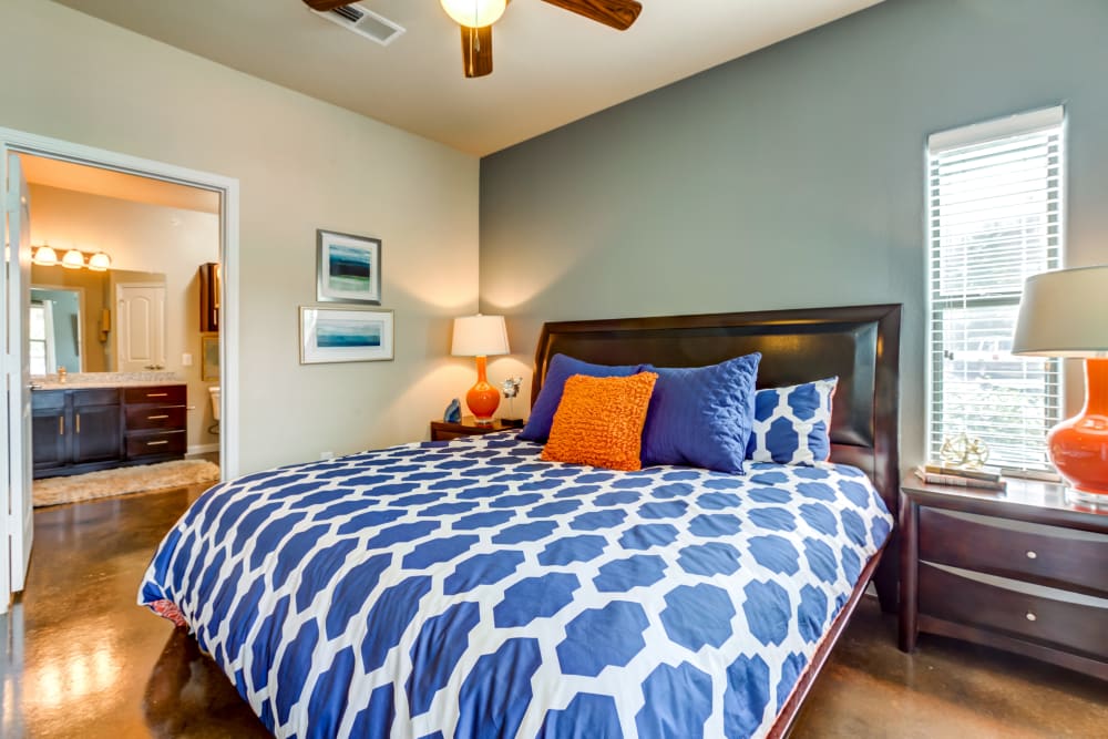 Model bedroom with attached bathroom at Legacy Brooks in San Antonio, Texas