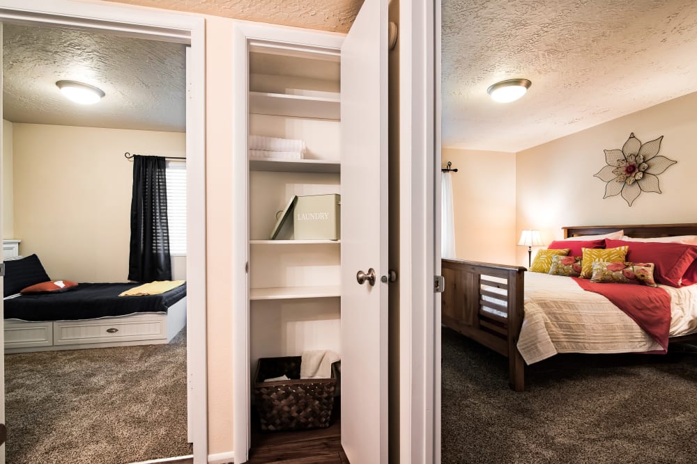 Hallway Closet & Bedroom at Cherry Creek Apartments in Riverdale, Utah