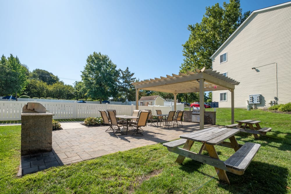 Patio with a grill at The Village at Voorhees in Voorhees, New Jersey