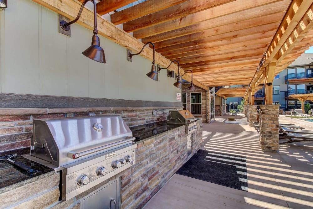 Outdoor BBQ Area at Timnath Trail at Riverbend Apartment Homes in Timnath, Colorado