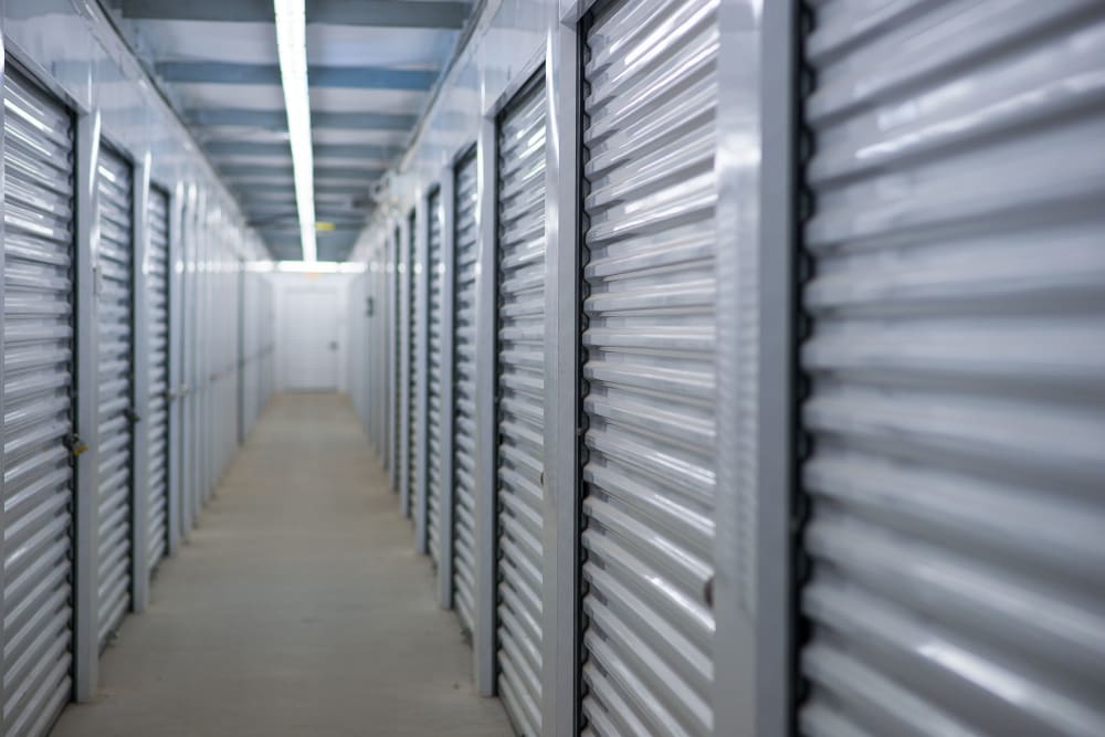 Bright and white interior unit doors at Apple Self Storage - Saint John East in Saint John, New Brunswick