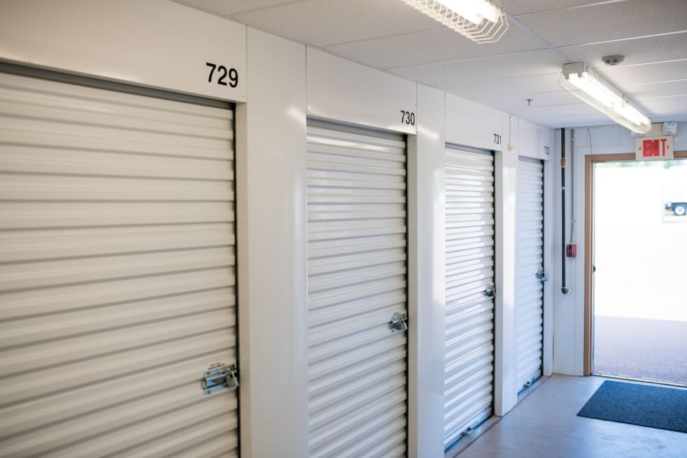 White doors on the interior storage units at Lighthouse Self Storage in Moncton, New Brunswick