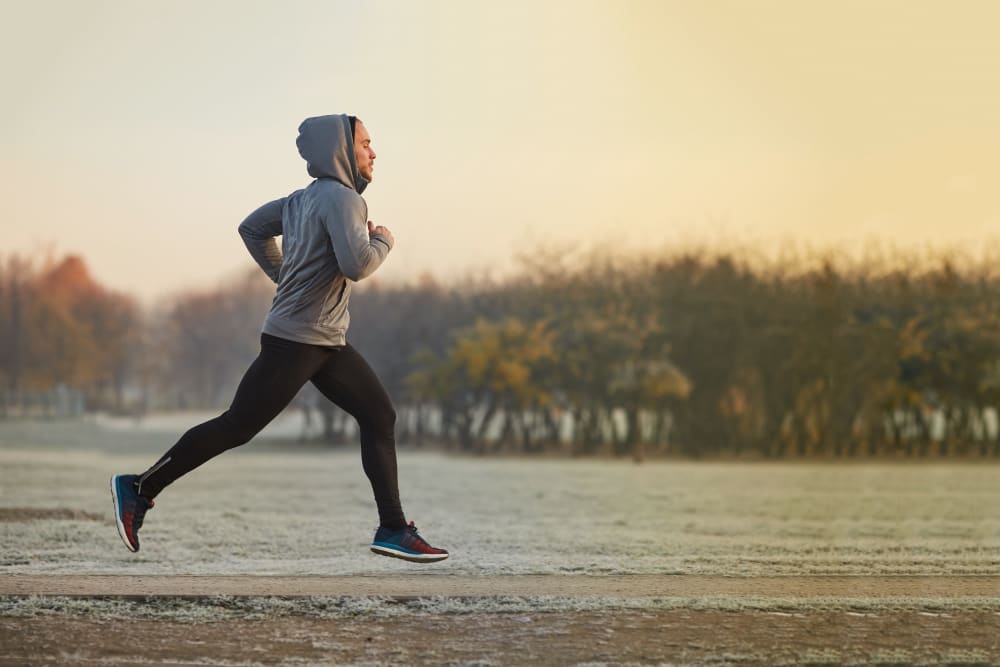 Resident running outside in Cazenovia, New York near Fennaway Green