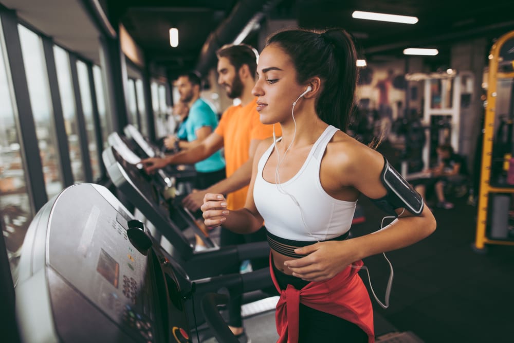 Resident working out at a gym in Syracuse, New York near Brookmanor
