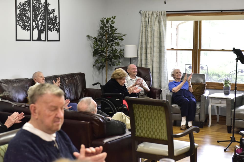 Residents enjoying a musical performance at Reflections at Garden Place in Columbia, Illinois