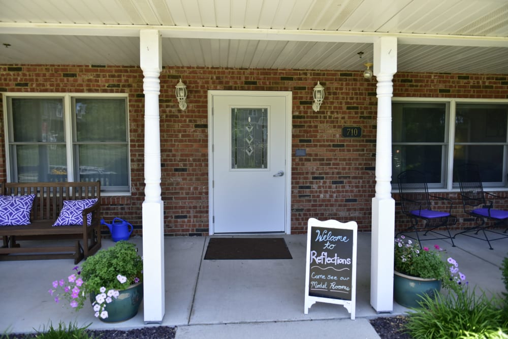 Porch and main building at Reflections at Garden Place in Columbia, Illinois. 