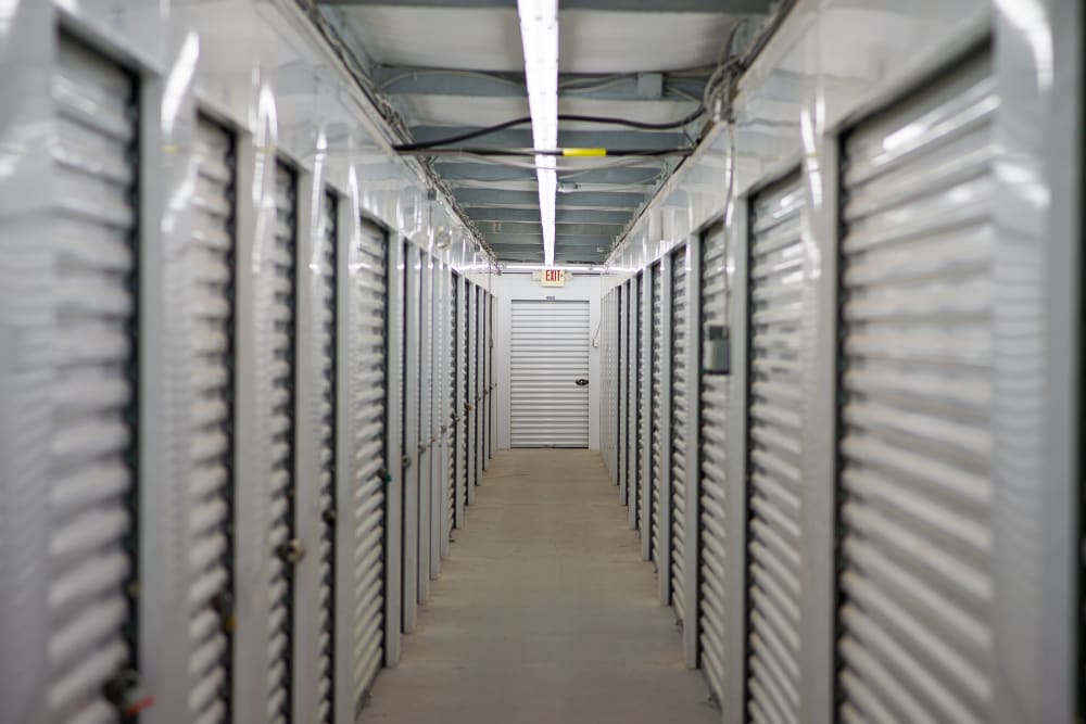 White doors on interior storage units at Apple Self Storage - Saint John North in Saint John, New Brunswick