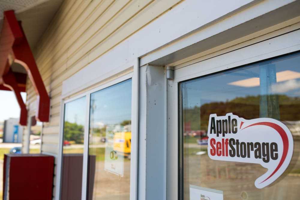 Logo on front door at Apple Self Storage - Saint John West in Saint John, New Brunswick