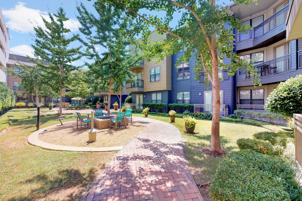 Lush landscaping at 5th Street Crossing at City Station in Garland, Texas