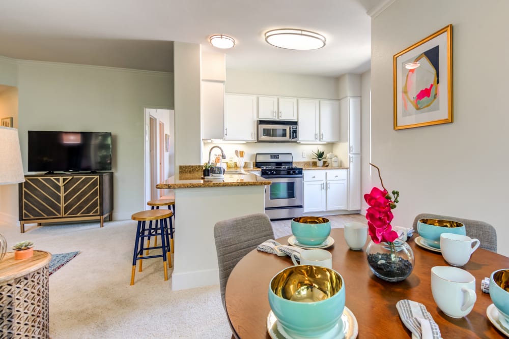 Spacious open floor plan with the kitchen overlooking the dining room at Sofi Shadowridge in Vista, California