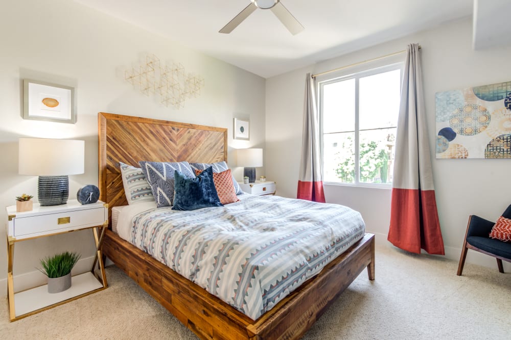 Large bedroom with a ceiling fan at Sofi Shadowridge in Vista, California