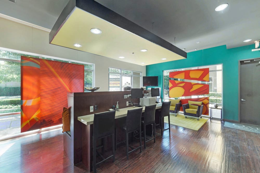 Business center with a printer at 5th Street Crossing at City Station in Garland, Texas