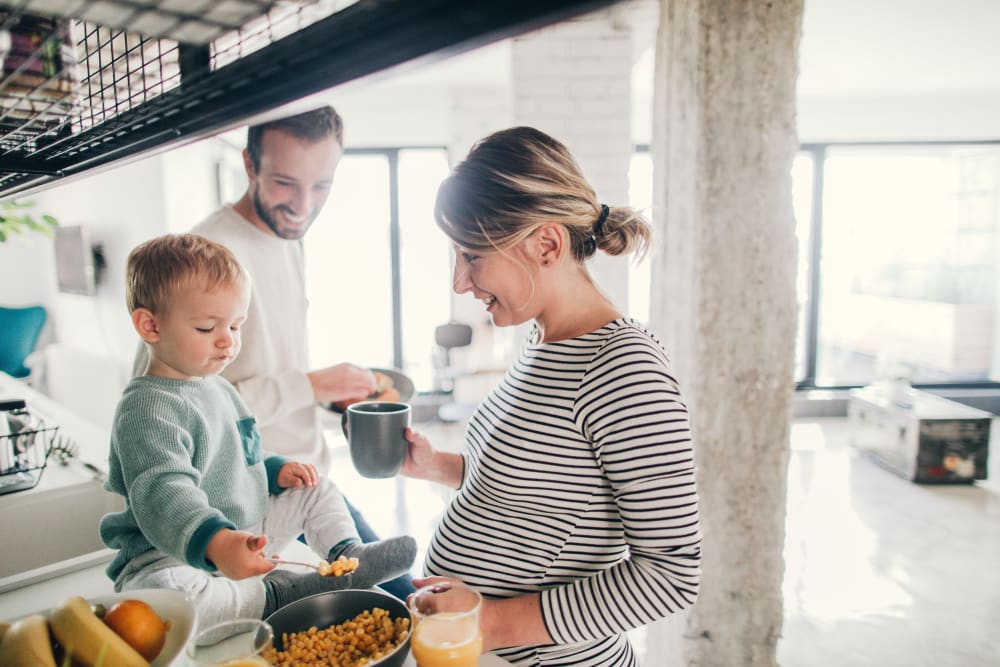 Family cooking together at Oaks Glen Lake in Minnetonka, Minnesota