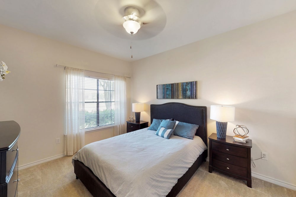 Cozy bedroom at Oaks Riverchase in Coppell, Texas