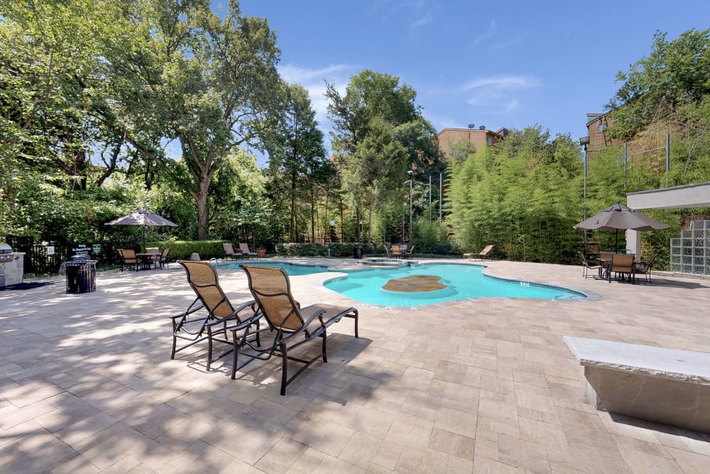 Poolside seating at Oaks White Rock in Dallas, Texas