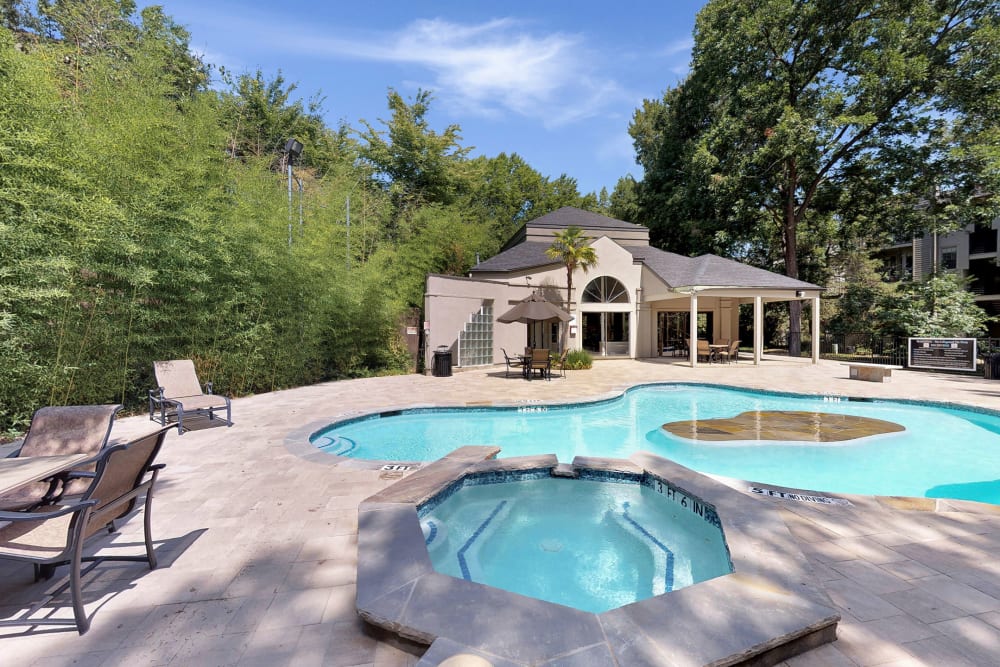 Hot tub and swimming pool at Oaks White Rock in Dallas, Texas